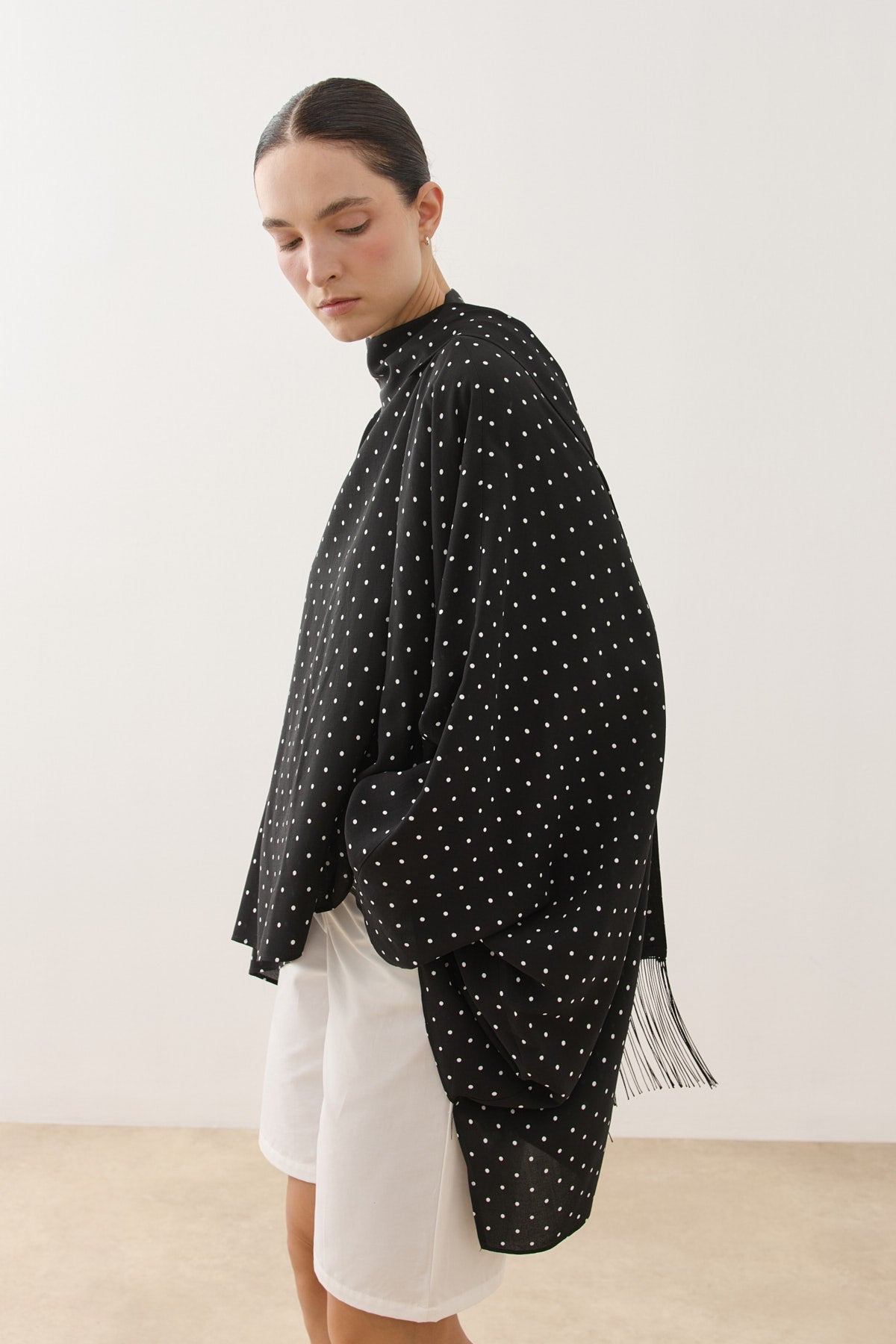 Polka Dot Poncho Blouse with Tassel Scarf Detail Black